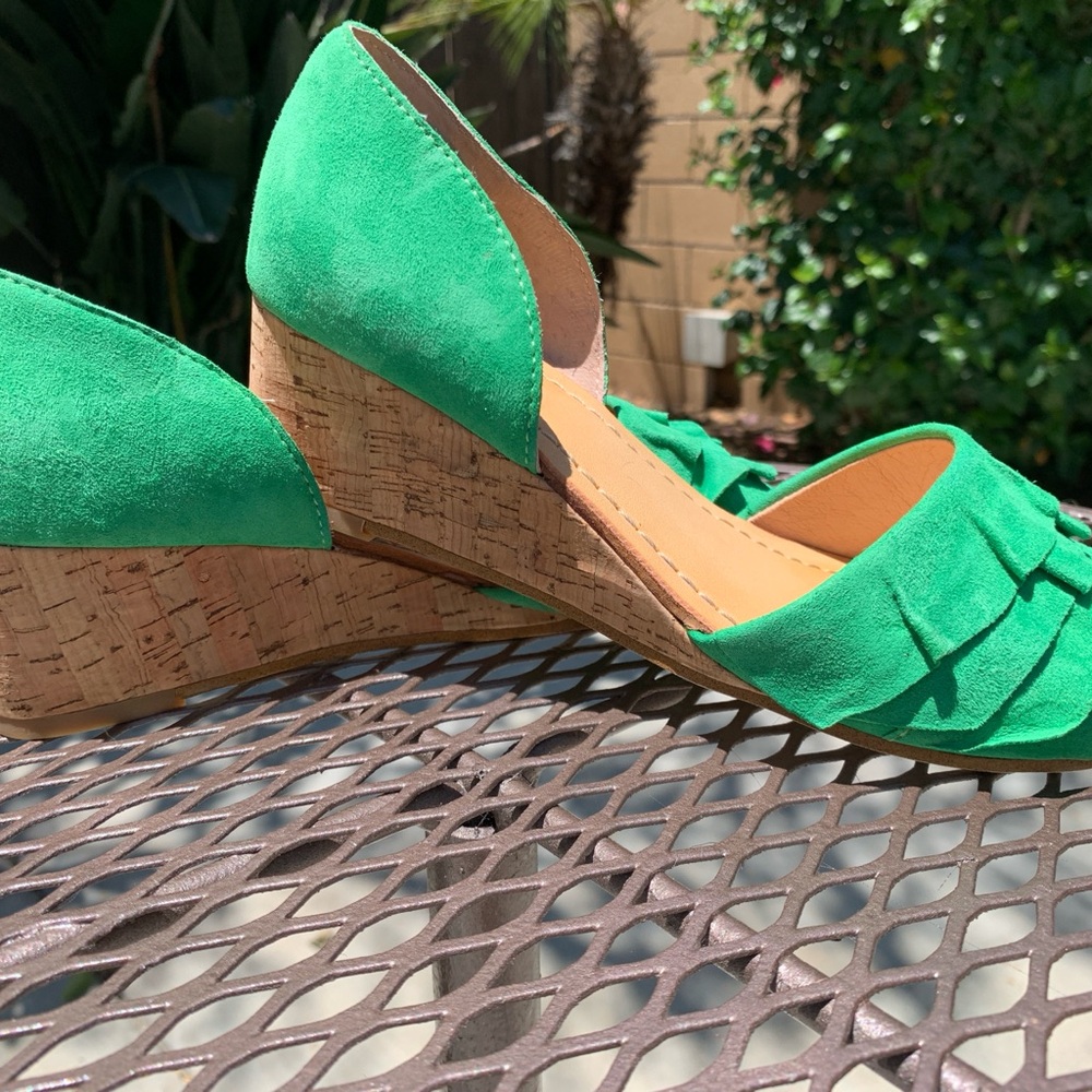 Only worn once, beautifil suede wedgas by Latigo. Runs a little big.